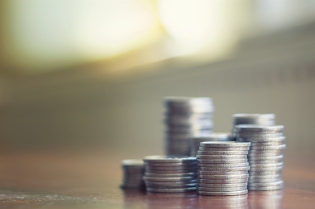 Stack of coins on table